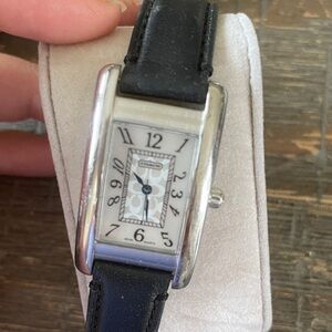 Coach black leather watch stainless steel and water resistant